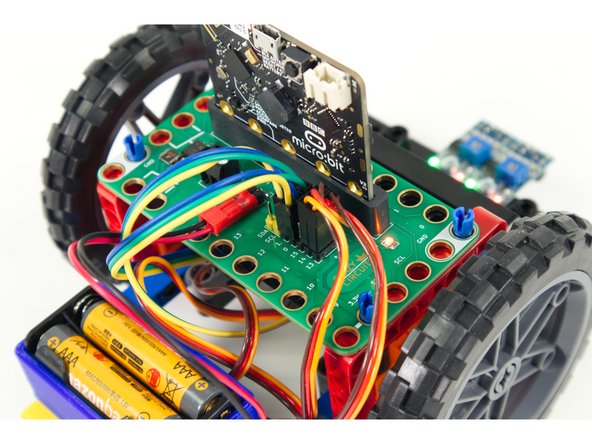 Each of the three wires from each sensor needs to connect to a pin on the Bit Board.