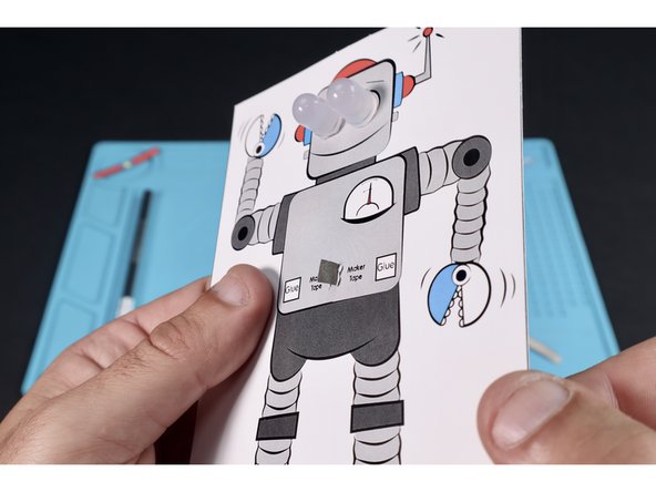 Turn card over. Adjust how much of section &quot;d&quot; is threaded through so that only that 1/4&quot; excess is showing.