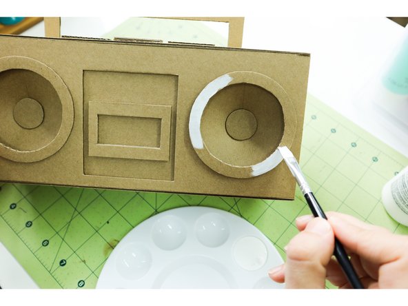 Paint the BoomBox.  I used 3 layers of neon paint on top of one layer of white paint to make it pop!