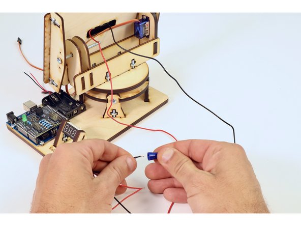 Gather the two blue wire nuts from your kit.