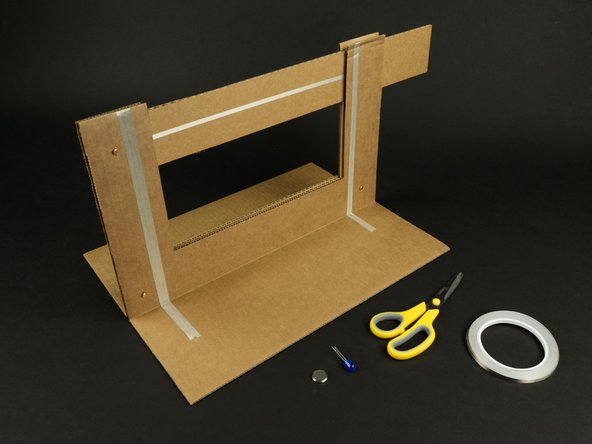 We're going to add a simple circuit consisting of our switch, a 10mm LED, and a CR2032 battery. We'll connect it all using conductive Maker Tape.
