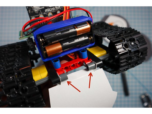 Use two pin/beam sets to connect the back of the penguin body to the Tank as shown.