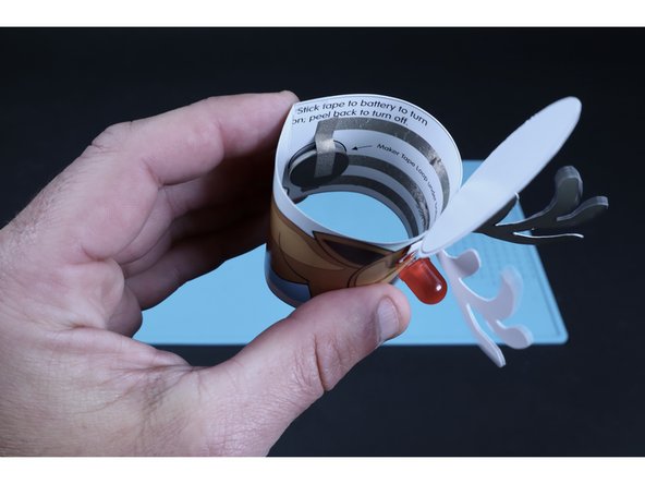 Stick the end of that piece to tape path immediately above it when viewing the project upright.