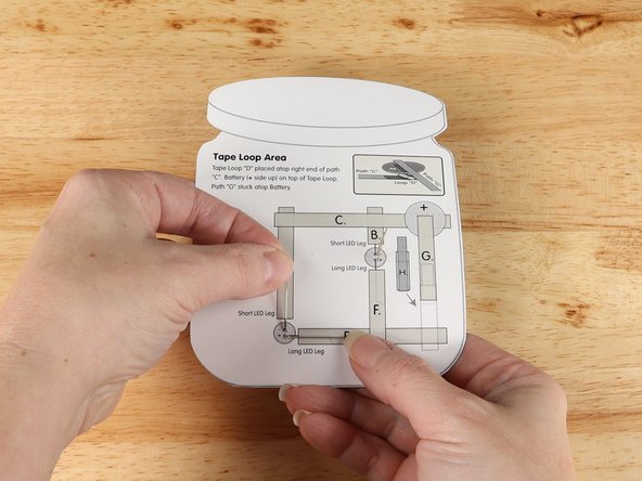 Bend the LED legs flat on the back following the diagram.
