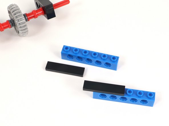 One stud of the the tile will stick off the end of the brick. You should have three studs still exposed.