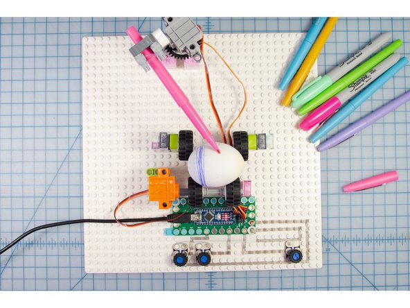 Place an egg in the egg cradle.