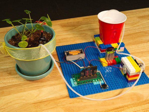 Hopefully you've already tested the Moisture Sensor in the first part of this guide, and you've also tested your water pump. Now that you've got it all together, test it again!