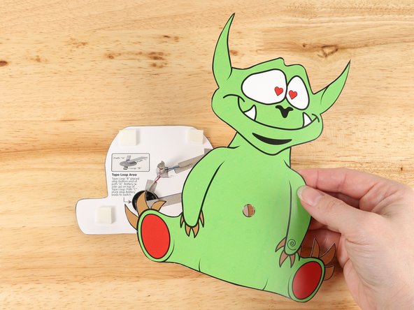 Place the monster template over the top of the motor so the motor goes through the small hole you cut earlier.