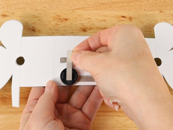 Add Maker Tape to tape path E. 