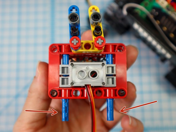 Add blue pins to the bottom as shown.