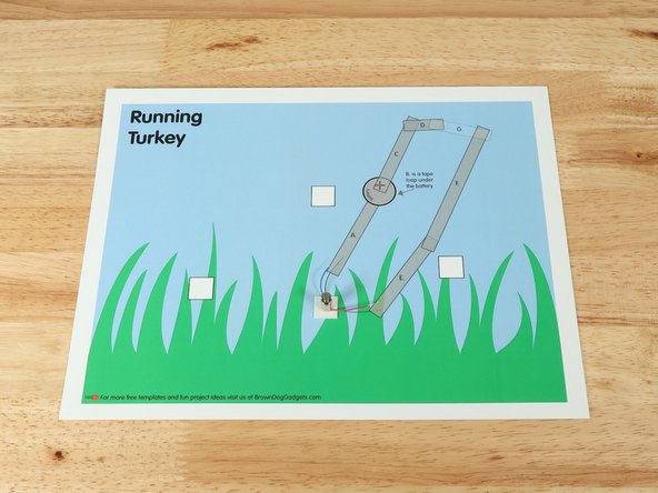 Stick the motor to the double sided tape making sure the back of the motor (with the wires) is stuck down to the tape and the part that spins faces upwards so it can move freely.