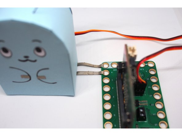 Connect the Maker Tape tabs to the Bit Board at pins GND and 0