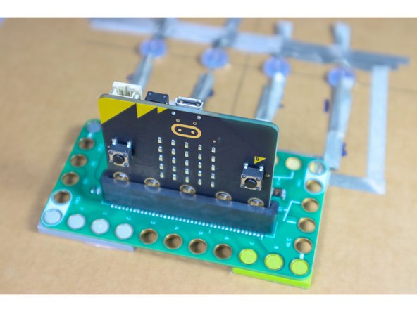 Insert the micro:bit into the bit board.