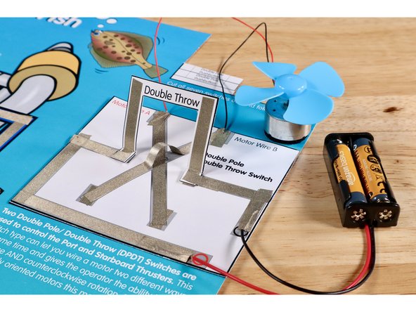 Push the lever all the way forward into contact with the contact points below. Observe the direction of rotation at the motor.