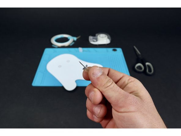 Use a pushpin to poke 4 holes where shown within the two circles that indicate where LEDs will be placed.