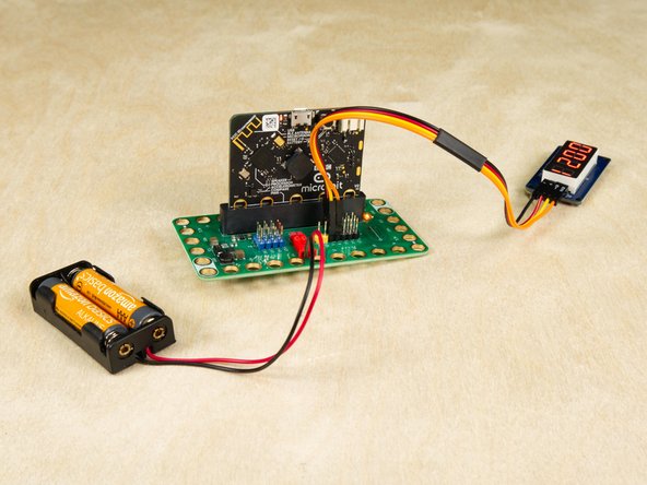 While testing various sensors you'll be moving the Bit Board and micro:bit around, so it may be easier to use the battery pack rather than the USB cable to power the circuit. (Though either will work just fine.)