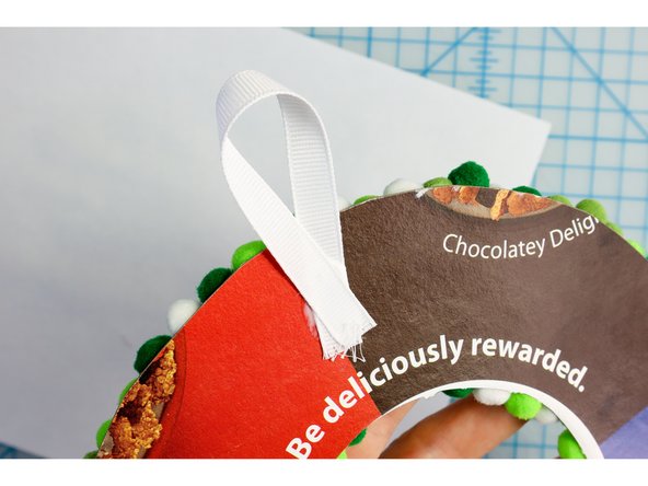 I glued a white ribbon to the top to make a hanger.