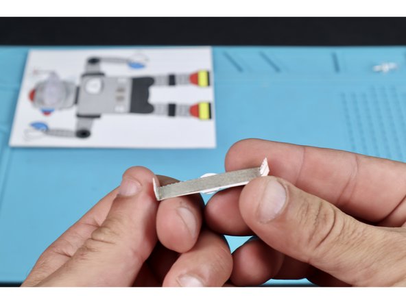 Measure, cut and stick a piece of Maker Tape on the back between the two new fold lines.