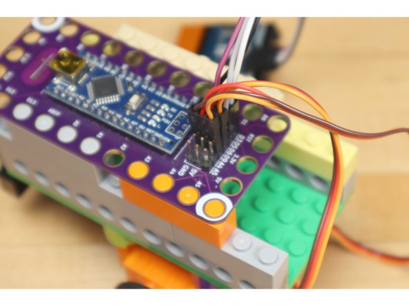 We'll want to orient the board so that you can easily plug in the USB cable for power. (We were lucky to find a very short USB cable in our &quot;Giant Bin of Random Cables&quot;)