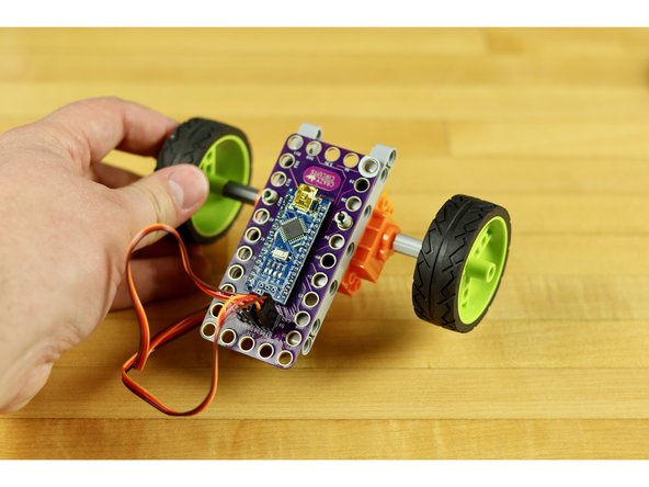 Use a couple of pegs to connect a robotics board on top, or to start building upwards to add in more components.