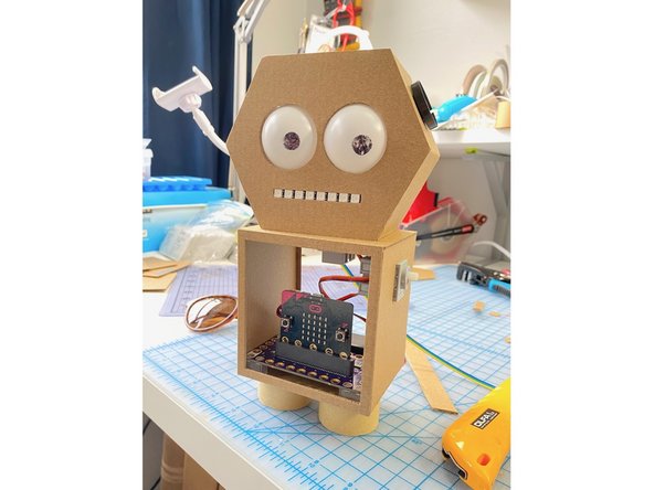 We used superglue to set all the pieces in place, then added the 8 Ohm speakers to each side of the head to give the appearance of &quot;ears.&quot;