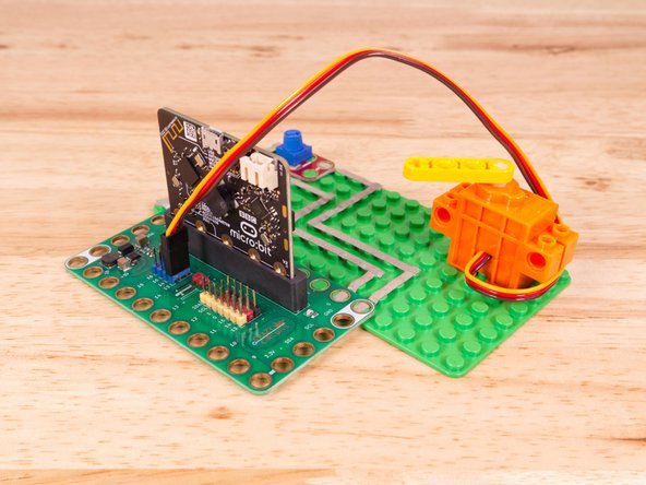 Then the Brown Wire should be closest to the micro:bit (in the - row) and the Red Wire will be in the middle (the +5v row).