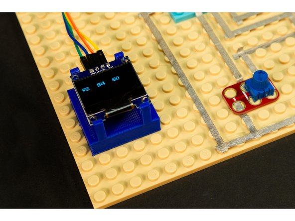 This step is optional, but the code will support the addition of an OLED Display to show the angles of the three servos.