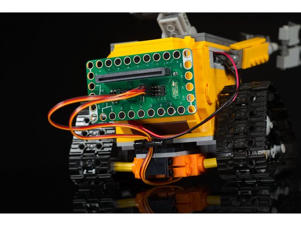 Connect the left servo to Pin 0 on the Bit Board, and connect the right servo to Pin 1 on the Bit Board.