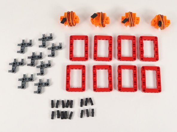 We'll start with 4 continuous rotation servos, 8 red frames, 8 gray 90° connecters, and 16 black pins.