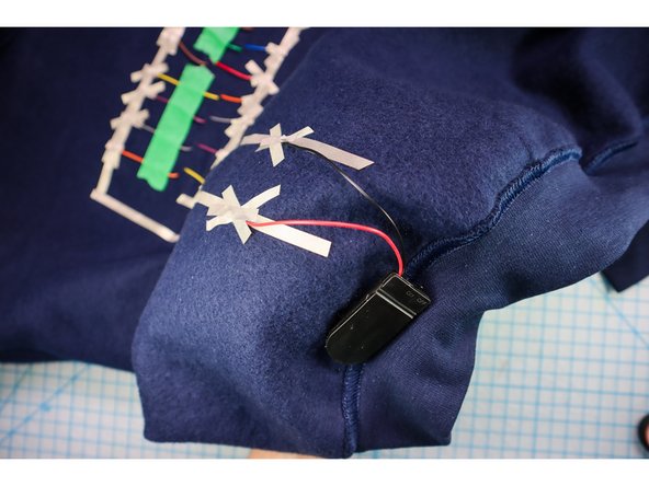 Add a few stitches to secure the wires where they exit the plastic case as well. (For more detail, see the video above).