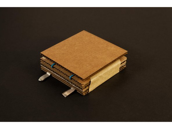 Adding Piece 11 is optional. Your Push Button will work just fine without it, but you can add it on using glue for a nice secure adhesion, or tape for a removable solution.