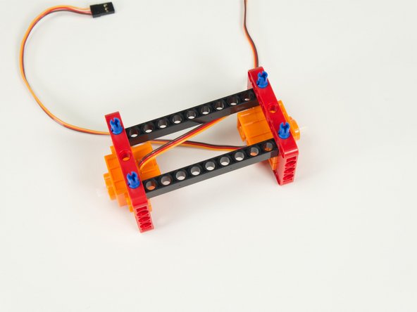 Note: The long pins should go in 2/3rds of the way, so make sure you have the orientation correct. (1/3rd should stick out the top.)