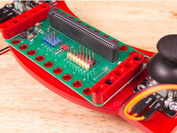 Note: We recommend you remove the micro:bit from the Bit Board for this part, as it can make it easier to connect the wires.