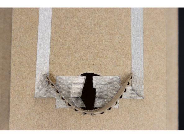 Cut 6, 1-inch pieces of Maker Tape, and fold down the first 1/4 inch so that that part doesn't stick.