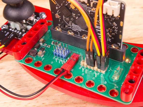 You can plug in the battery pack now, or wait until after you load the code.