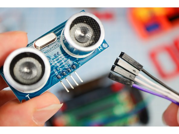 Use 4 wires to connect the Distance Sensor to the Bit Board like this: Trig to Pin 0, Echo to Pin 1, VCC to &quot;+&quot;, and GND to &quot;-&quot;.