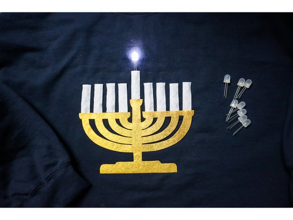 Insert the LEDs into the jumper wires, as any other menorah!