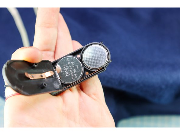 Add a few stitches to secure the wires where they exit the plastic case as well. (For more detail, see the video above).