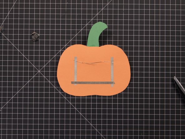 Add Maker Tape so the two shorter (negative) legs on the outside are connected with a third piece of tape forming a “U” shape.