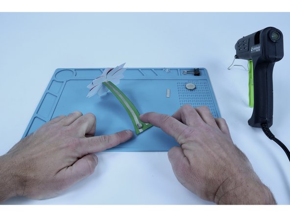 Stick this tape loop where shown in photo 3.