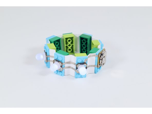 Make a light-up &quot;Brick Bracelet&quot; using paper, Maker Tape, and some Crazy Circuit parts!