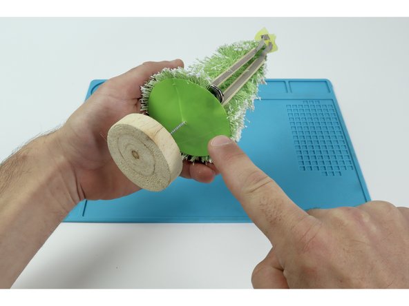 To set up solutions to each of these problems, begin by parting the branch material in one spot as if were hair. The part should go from the top of the tree all the way down the height of the tree.