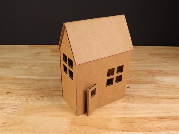Carefully cut out all 5 panels for the house and assemble using hot glue.