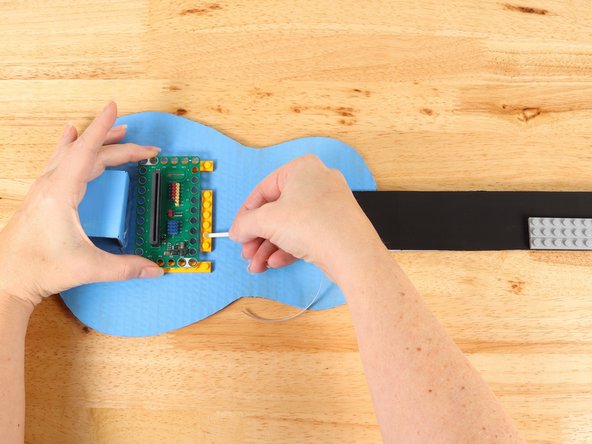 There will be four tape paths going up the neck. These paths cannot touch each other. Make sure to plan your space for each path accordingly.