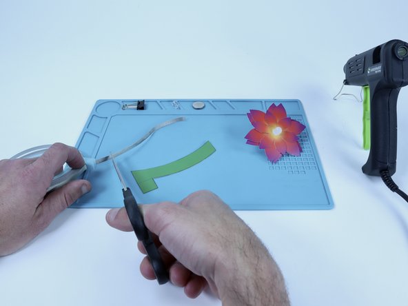 Measure and cut one Maker Tape segment that is roughly the length of the stem.