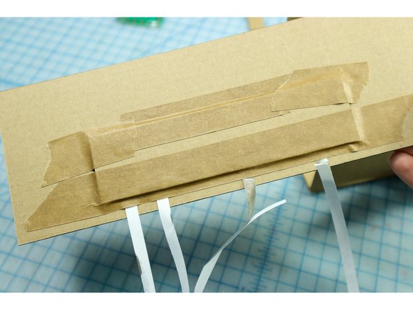 Use very strong tape to tape the two pieces together from the bottom.