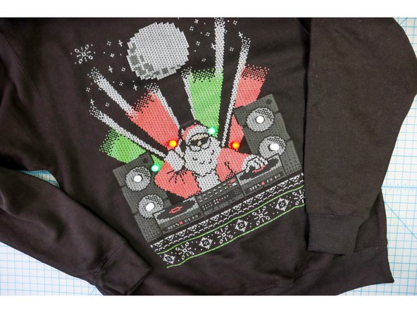 Turn the shirt right side out and watch your design illuminate!