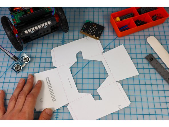 Cut out the head and body template along the solid lines using a craft knife for the interior shapes and scissors or a craft knife for the perimeter.