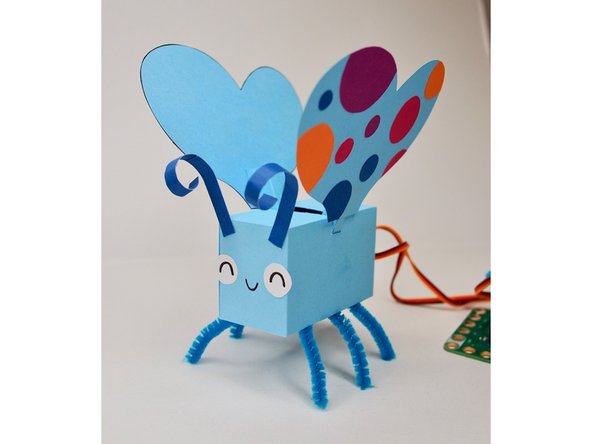 Botterfly is friendly but a little skittish — so if you move your hand close to the micro:bit, it should flutter its wings!