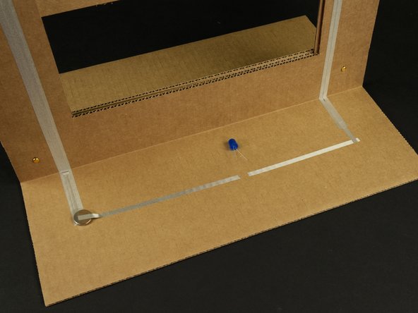 Then tape down the LED legs (after spreading them apart).